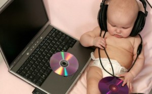 cute-baby-with-laptop-and-listen-music_422_78796